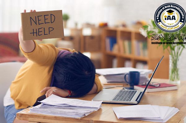 Exhausted stressed woman at her workplace
